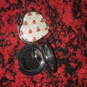 They are two mini mirrors for your pocket.